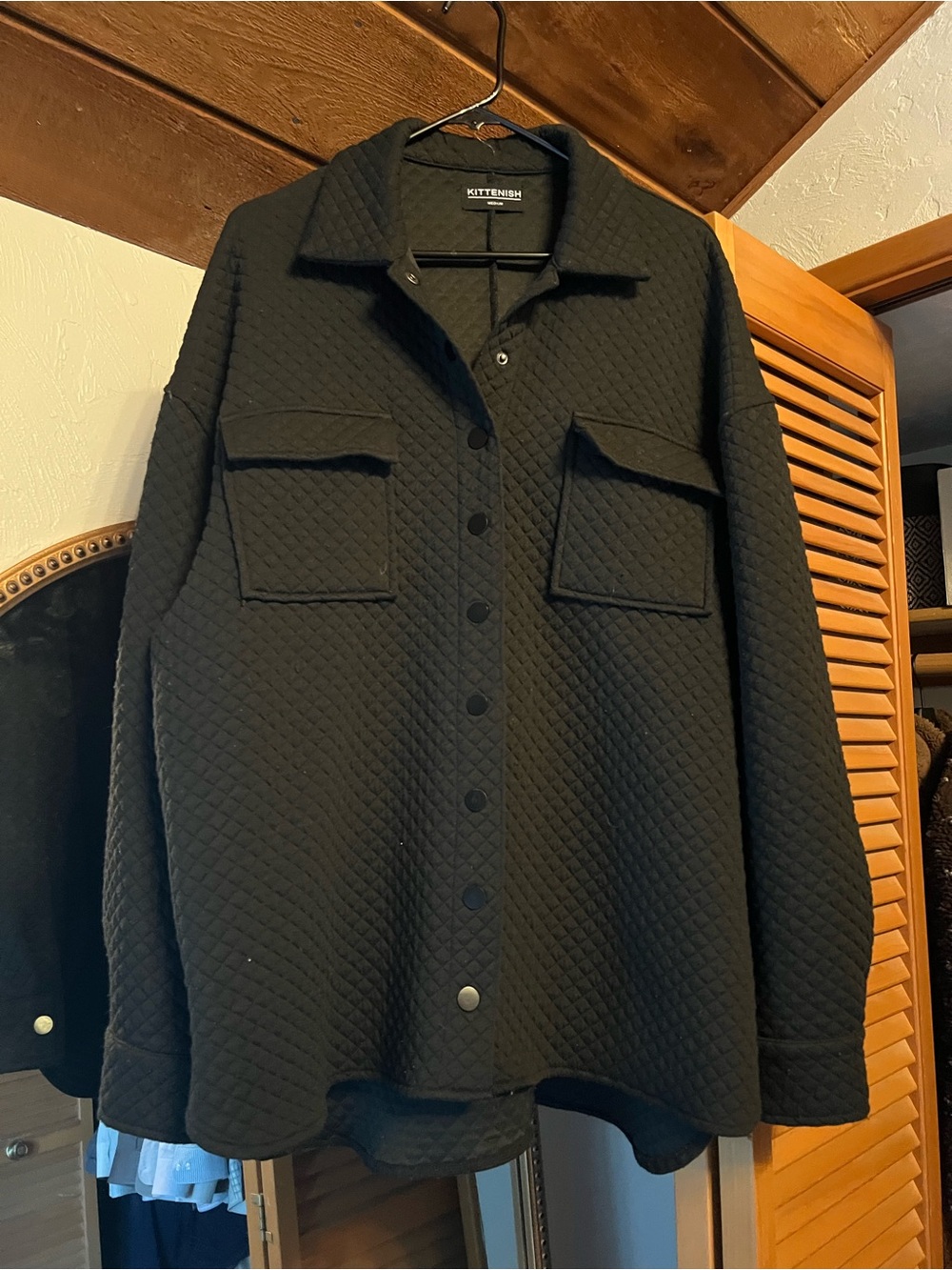 Kittenish Black Quilted Button-Down Shirt Jacket